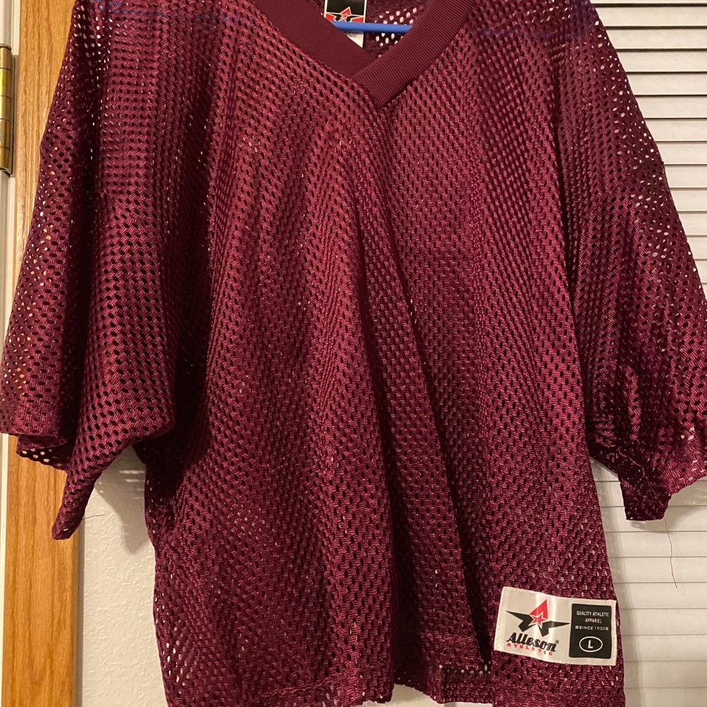 Plain maroon sports jersey